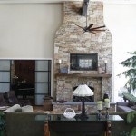 William H. Mann & Son Custom Built Fireplace wood shelf and stone wall