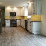 White Cabinets with Wood Flooring